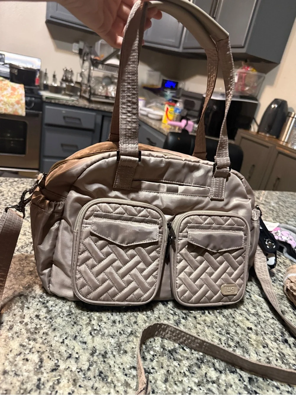 Lug Quilted Crossbody Bag in Taupe